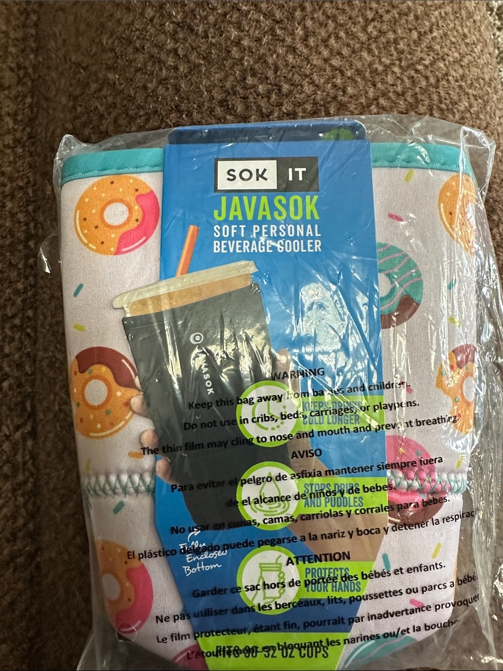 Java Sok beverage sleeve. Keeps drinks cold. Size large print is Donut Delight